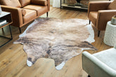 Warmstead Furniture - Ashley Furniture - Sportsmen Rug - 6'5" x 7'11" Rug / Brown - R406012